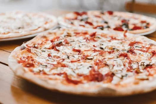 stampede supreme pizza with multiple toppings