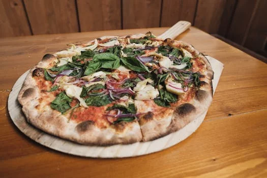 prairie veggie pizza with fresh vegetables