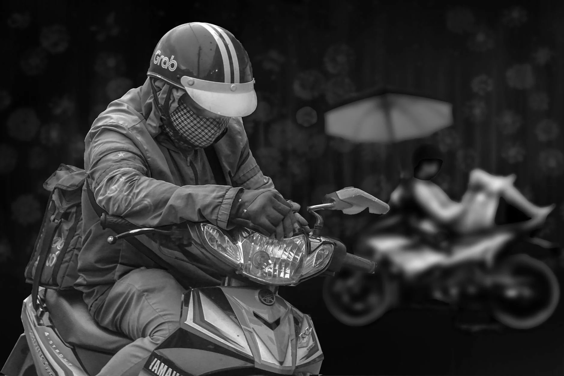 pizza delivery driver on motorcycle